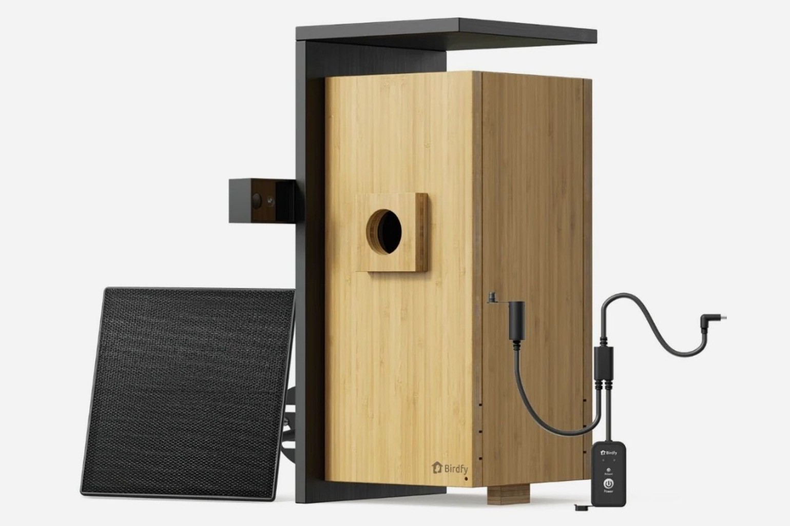 Birdfy Nest Duo smart birdhouse with solar roof mounted on a pole