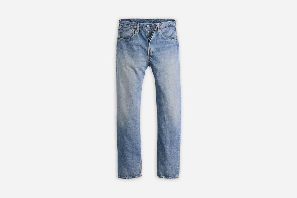 Levi's 1954 501 selvedge jeans folded on a table
